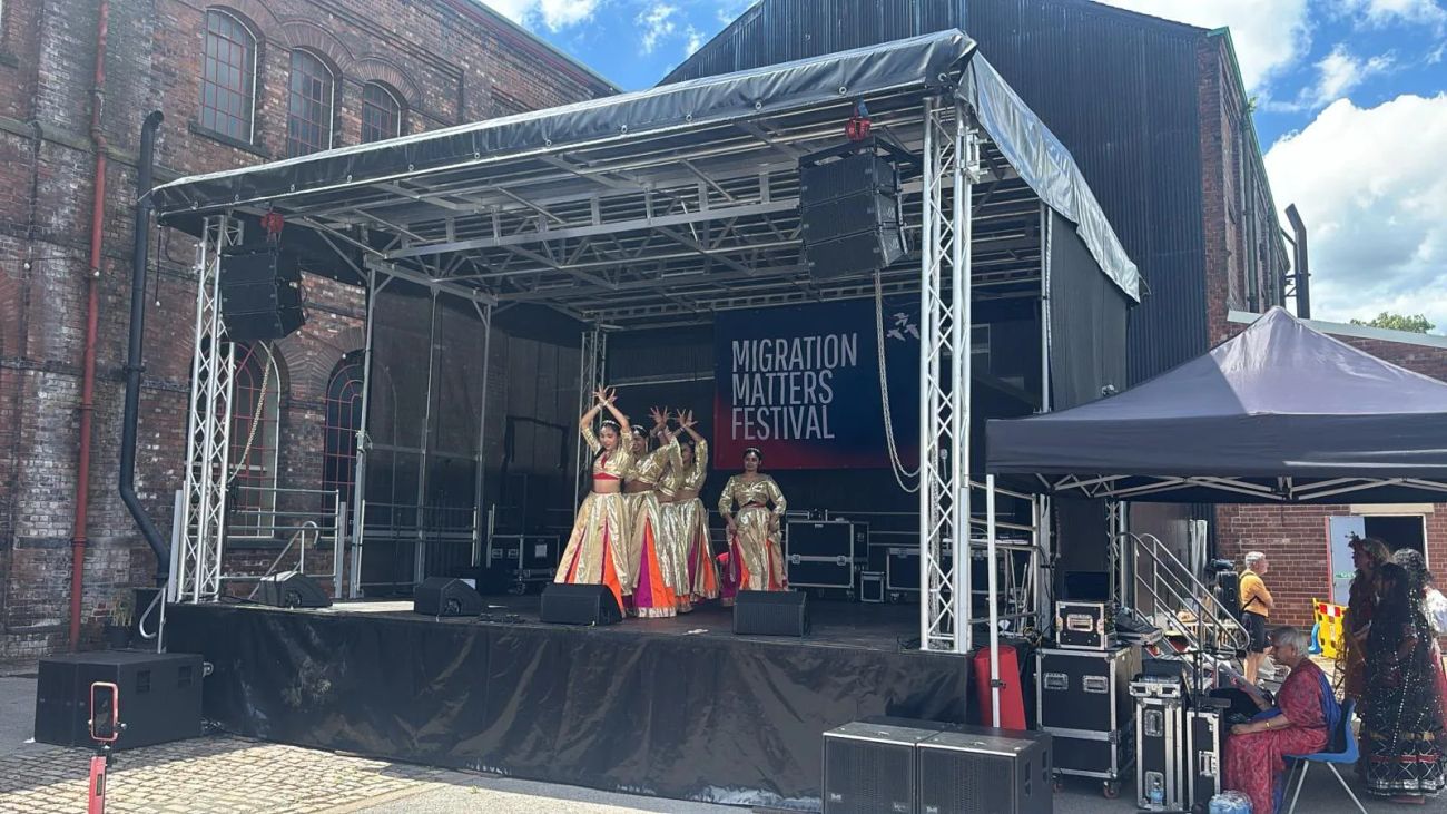 Dancers performing on a 7x6m show stage with flown PA