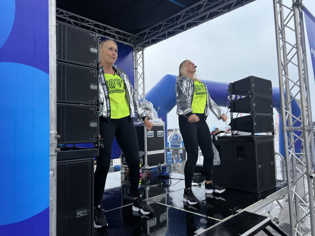 Performers on stage at a charity event